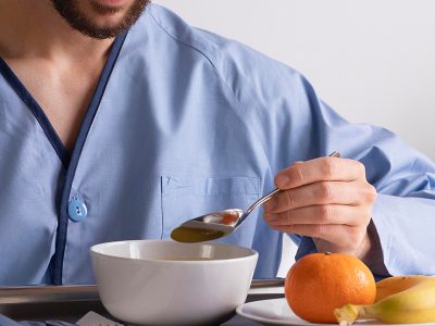 ill-male-patient-bed-hospital